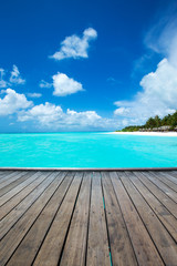 Fototapeta na wymiar tropical Maldives island with beach , sea , blue sky