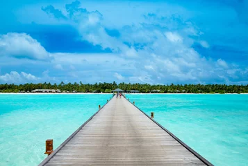 Fotobehang tropical Maldives island with beach , sea , blue sky © Pakhnyushchyy