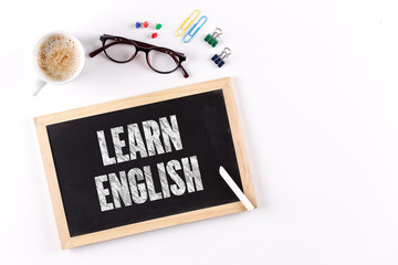 LEARN ENGLISH word on Chalkboard with Coffee Cup, view from above