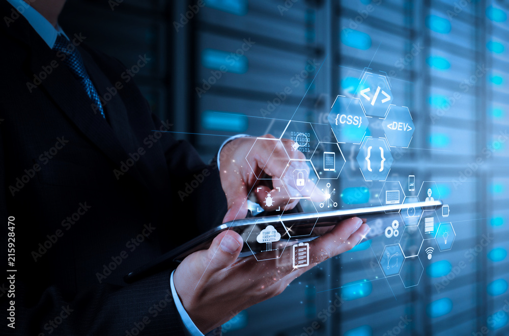 Poster businessman using tablet computer and server room background