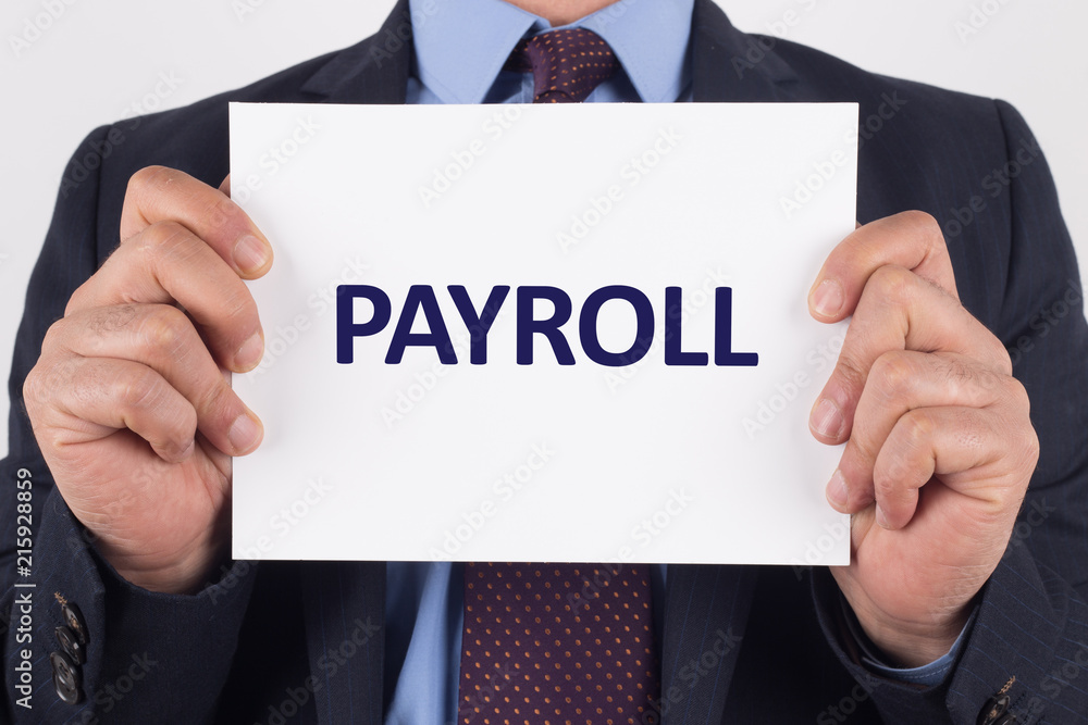 Wall mural Man showing paper with PAYROLL text