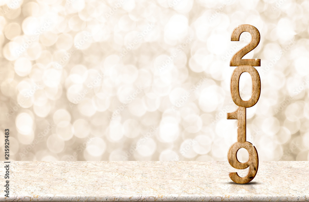 Poster happy new year 2019 wood with sparkling star on marble table with gold bokeh background,holiday fest