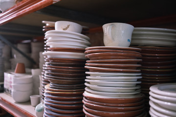 Ceramic dishes in working process. Creating ceramic pieces. Tradicional ceramic factory in spain