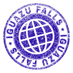 IGUAZU FALLS stamp print with distress texture. Blue vector rubber seal print of IGUAZU FALLS title with scratched texture. Seal has words arranged by circle and planet symbol.