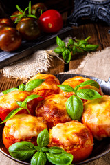 Tomatoes stuffed with rice and cheese from the oven