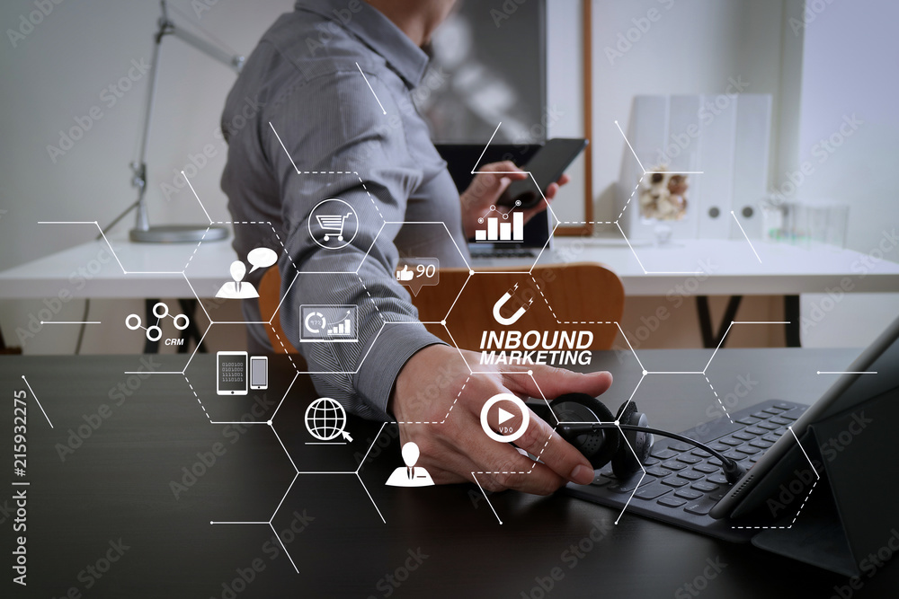Poster businessman using voip headset with digital tablet computer and smart phone,as concept communication