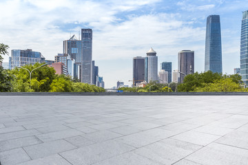 Panoramic skyline and modern business office buildings with empty road,empty concrete square floor