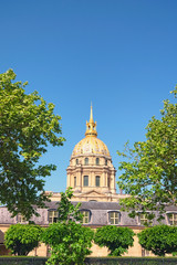 The Cathedral of Invalids in sunny spring day. Famous touristic places and travel destinations in Paris. Travel and tourism concept. Paris, France