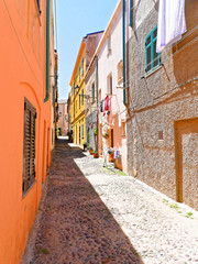 Fototapeta na wymiar A narrow alley in Alghero. Sardinia, Italy.