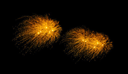 Fototapeta premium Golden Fireworks explosion on black sky