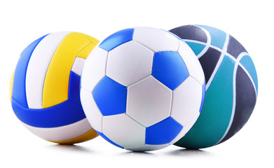 Three sport balls over white background