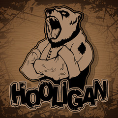 print on T-shirt "hooligan" with a bear image on a wooden background.