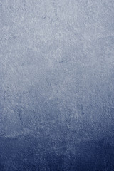 blue abstract background of dark plaster