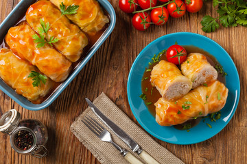 Traditional stuffed cabbage with minced meat and rice, served in a tomato sauce.