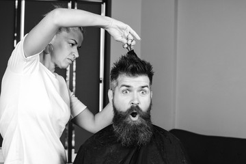 Surprised hipster in hairdressing salon. Portrait of stylish man and beard. Brutal bearded man,...