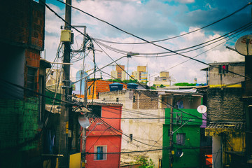 Colourful worn houses of a favela in Brazil.