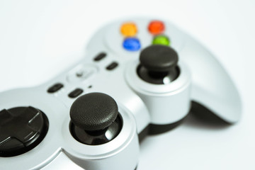 A wireless video game controller, joystick, isolated on white background. © alicefoxartbox