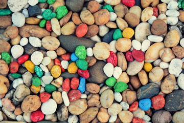 Colorful pebbles background or colored gravel background
