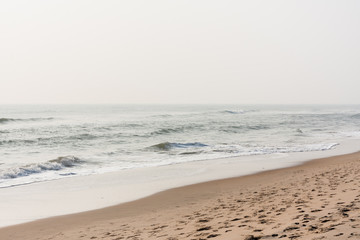 Calm waves on beach - Calm sea waves at morning time on a tropical beach.