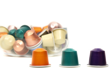 Classic coffee capsules isolated on white background