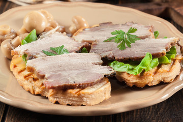 Sandwich with baked pork belly