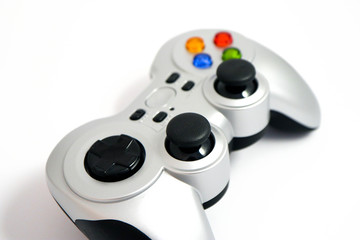A wireless video game controller, joystick, isolated on white background. © Alice Fox