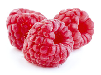 ripe raspberry fruits isolated on white background