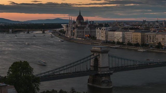 Day to night time lapse with amazing view of Budapest with Parliament building, Chain bridge and Danube river
