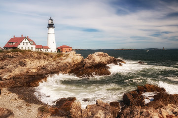 Fototapeta na wymiar Coast of the Atlantic Ocean. Lighthouse on the shore. Maine. Portland. 