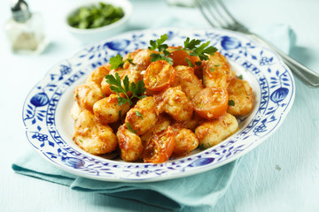 Homemade gnocchi with tomato sauce
