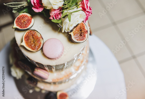 Top View Of A Wedding Cake Decorated With Fig Fruit Macarons And