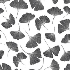 Fototapeta na wymiar Seamless monochrome floral pattern with leaves of gingo biloba. Vector silhouettes on white background .