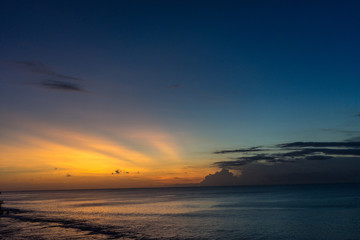 sunset in bali island, indonesia with golden sky