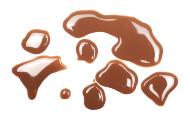 Spilled chocolate milk puddle isolated on white background, top view