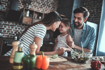 Family on kitchen