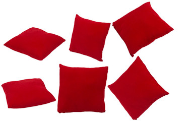 Red velvet pillow isolated on white background