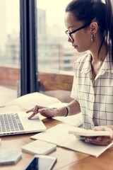 A woman working on a laptop