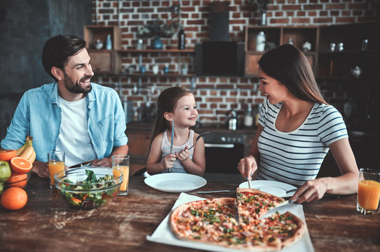 Family on kitchen
