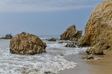 picturesque carved rocks on California coast El Matador State Beach, Malibu