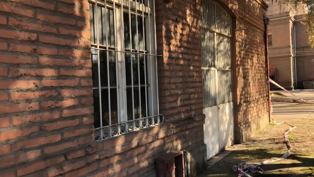 Metal fence and gate - Yard and exterior construction of the abandoned asylum of the sisters of the poor located in santiago de chile