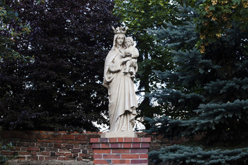 The statue of the Virgin Mary with the crown holding the baby Jesus in her arms in the Sanctuary of the Mother of God, in the Swieta Katarzyna, Lower Silesian Voivodeship