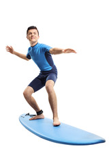 Fototapeta na wymiar Teenage boy surfing