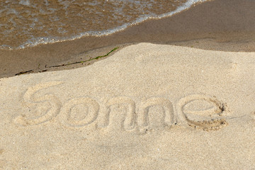 Botschaft im Sand - Sonne