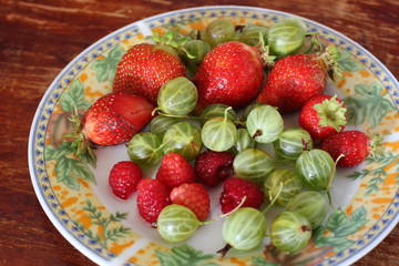 Strawberry and agrus. Berries on a plate