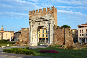 Fototapeta na wymiar Famous place in Rimini, Italy. Arch of Augustus, the ancient gate of the city.