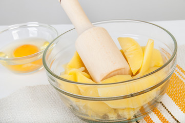 Glass bowls with boiled potatoes and egg.