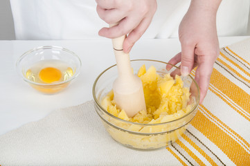 Glass bowls with boiled potatoes and egg.
