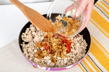 Tomato puree and chopped meat