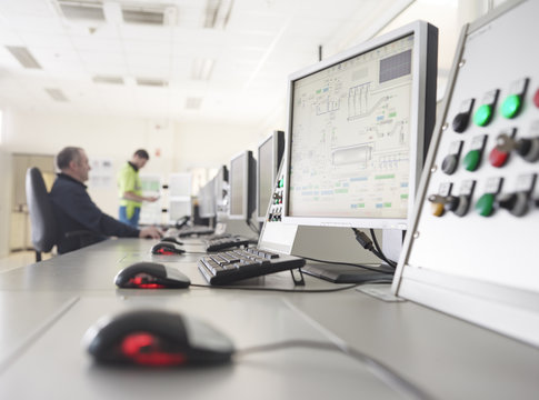 Rumania, woodworking, workers in monitoring center