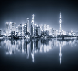 Fototapeta na wymiar shanghai skyline night view and reflection